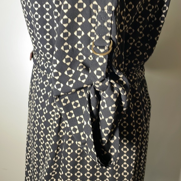 Skies are blue black & beige dress. - Picture 3 of 7